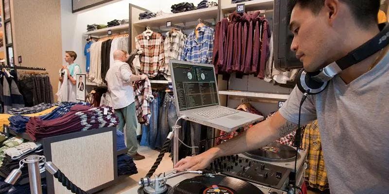 Cover Image for Why Should I Consider a Live DJ to Amplify My Brand's In-Store Experience?